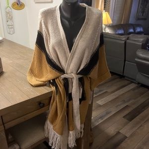 New Directions waist tie sweater with three quarter sleeves and fringe bottom.